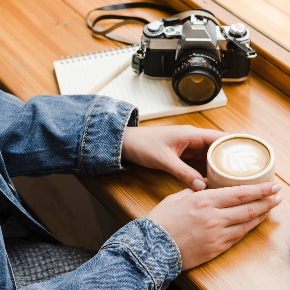 Medium shot woman with coffee cup